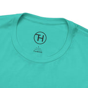 Close-up of the neckline of a Kid & Puppy Love T-Shirt in vibrant turquoise, made of 100% cotton.