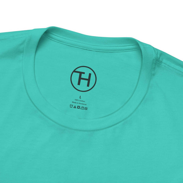 Close-up of the neckline of a Kid & Puppy Love T-Shirt in vibrant turquoise, made of 100% cotton.