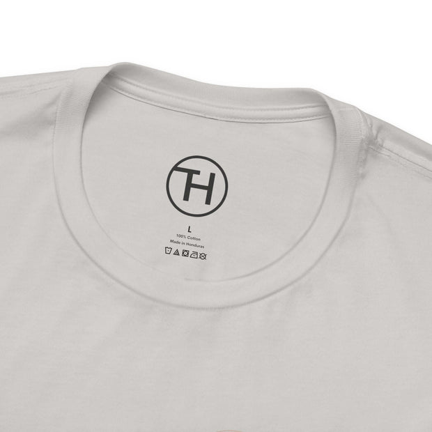 Close-up of the collar and label of a Pet Lovers Tee in white, showing fabric care details.