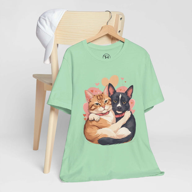 Cute pet lovers tee featuring a cat and dog graphic, perfect for casual wear and animal enthusiasts.