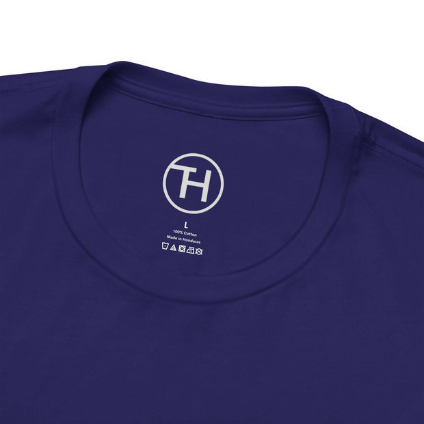 Close-up of a unisex purple jersey tee collar, showcasing soft cotton fabric and labeled size for comfort and style.
