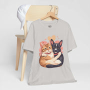 Cute pet lovers tee featuring a graphic of a cat and dog cuddling, perfect for animal enthusiasts and casual wear.