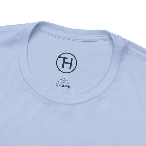 Close-up of Kid & Puppy Love T-Shirt collar showing soft, lightweight cotton fabric and care label details.