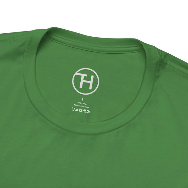 Close-up of green unisex jersey short sleeve tee collar, perfect for dog lovers and casual wear.