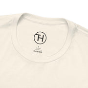 Kid & Puppy Love T-Shirt close-up showing soft cotton fabric and care label, ideal for casual wear and gifts.