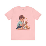 Kid & Puppy Love T-Shirt featuring a child and puppy in a heartwarming embrace on a pink shirt.