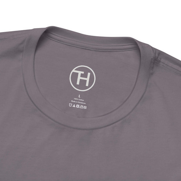 Close-up of the collar and label of a heartwarming dog lover unisex tee in gray, highlighting its comfort and style.