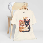 Pet Lovers Tee featuring cute illustration of a cat and dog cuddling, perfect for animal enthusiasts.