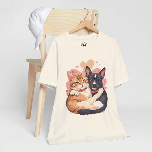 Pet Lovers Tee featuring cute illustration of a cat and dog cuddling, perfect for animal enthusiasts.