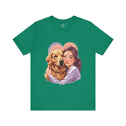 Heartwarming dog lover tee featuring a girl hugging a golden retriever on a green short sleeve shirt.