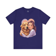Heartwarming dog lover tee featuring a girl hugging a golden retriever on a navy blue shirt.